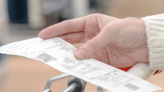 Fin de l’impression automatique du ticket de caisse : nouveau report !